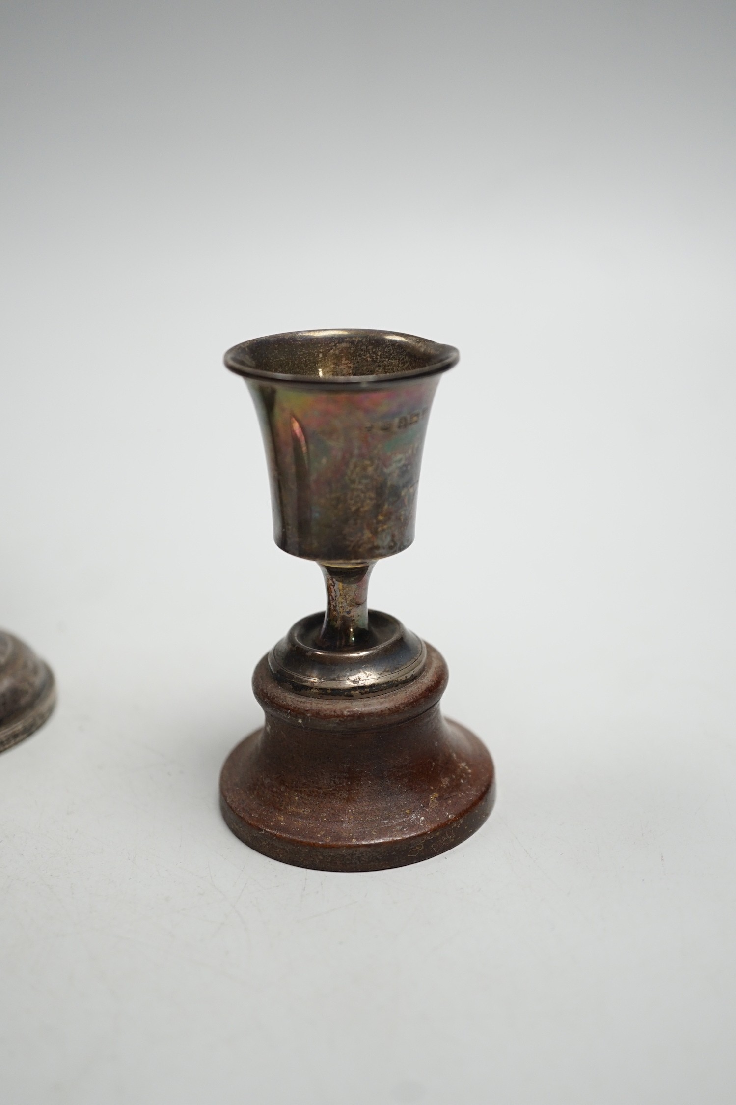 A George V silver two handled bowl, by Sebastian Garrard, London, 1926, 15.5cm, 6.5oz, a silver card case, small silver cup and a Ceylonese white metal posy vase.